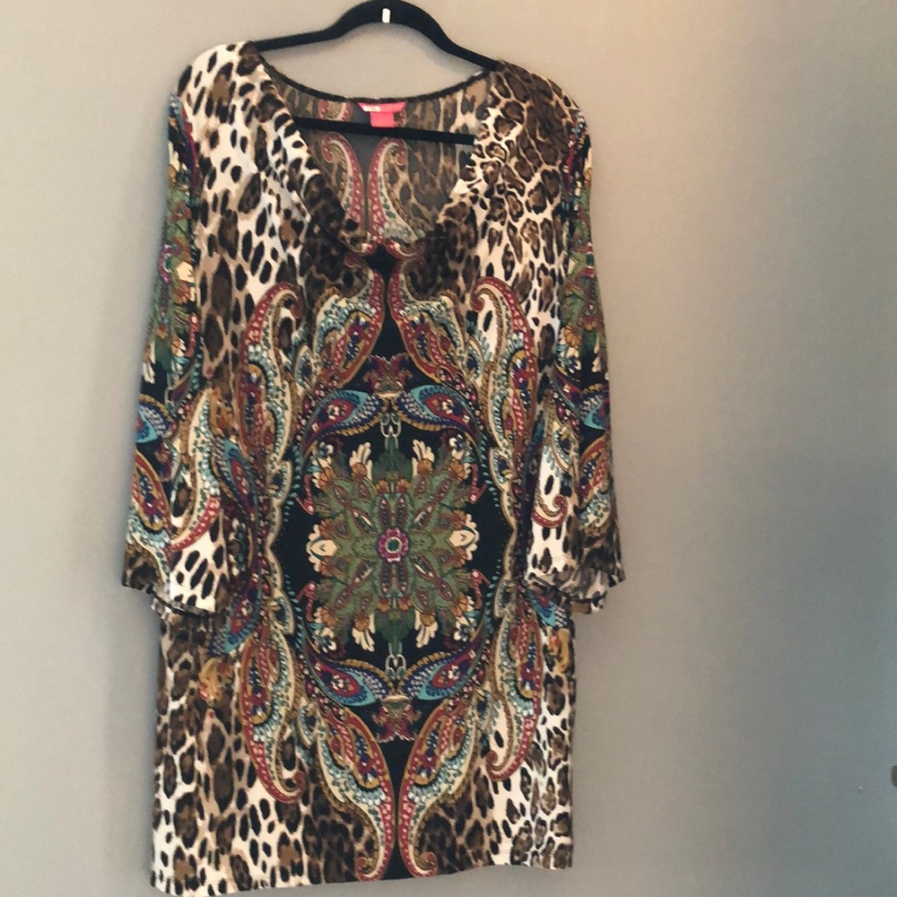 Multi colored oversized blouse. Wear with black pants.